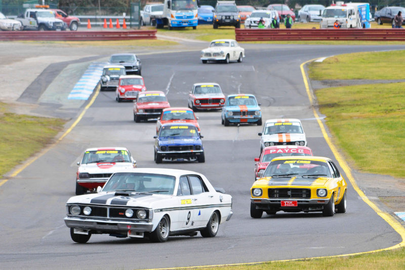 Spud Smith leads the field into Turn 2