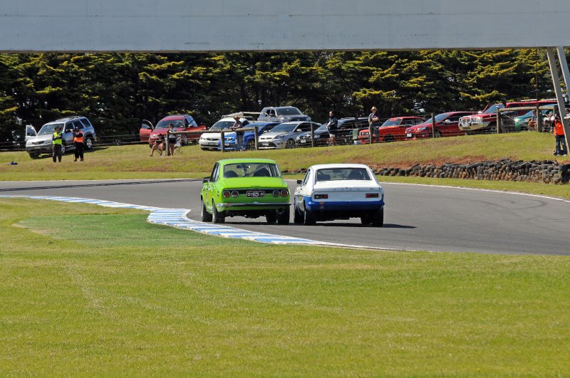 Quentin Bland's Capri and Anthony Read's Mazda fought over every inch of the road