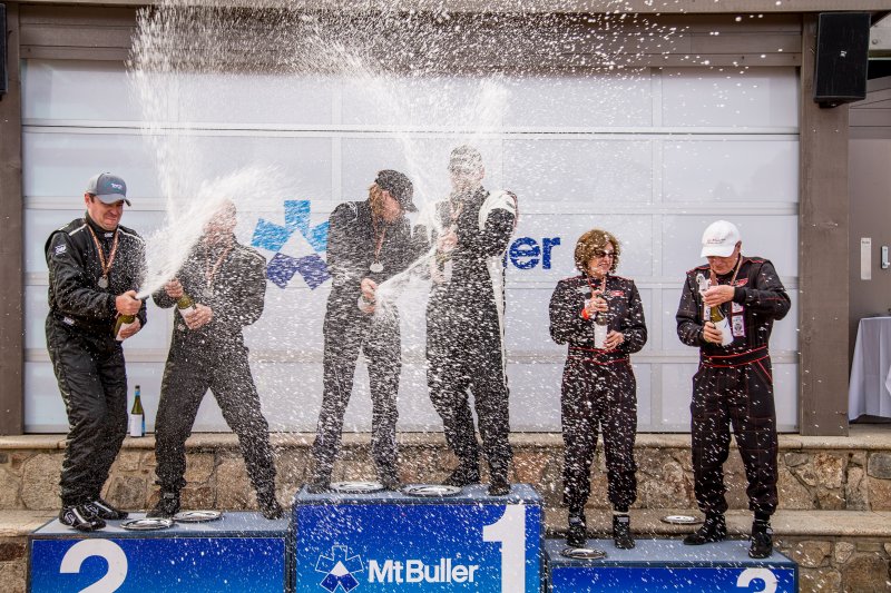 Older chaps sometimes have difficulty spraying on cue... Congratulations Brian and Linda Dermott on your podium!