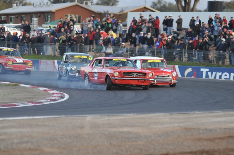 Bill Trengrove's Mustang gets hot into Turn 1