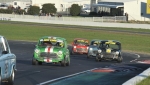 Bug-eyed in the afternoon sun, Minis swarm up pit straight