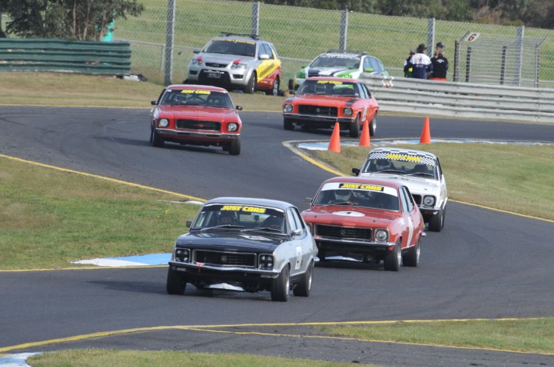 SA\'s Brett Munns leads the Toranas of Stephen Pillekers and Mark Brewster