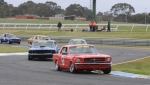 Bill Trengrove\'s 289 Mustang ahead of Stuart Barnes\' 69 Fastback