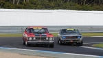 Les Walmsley\'s Charger slips under Brett Hotchkin\'s Falcon