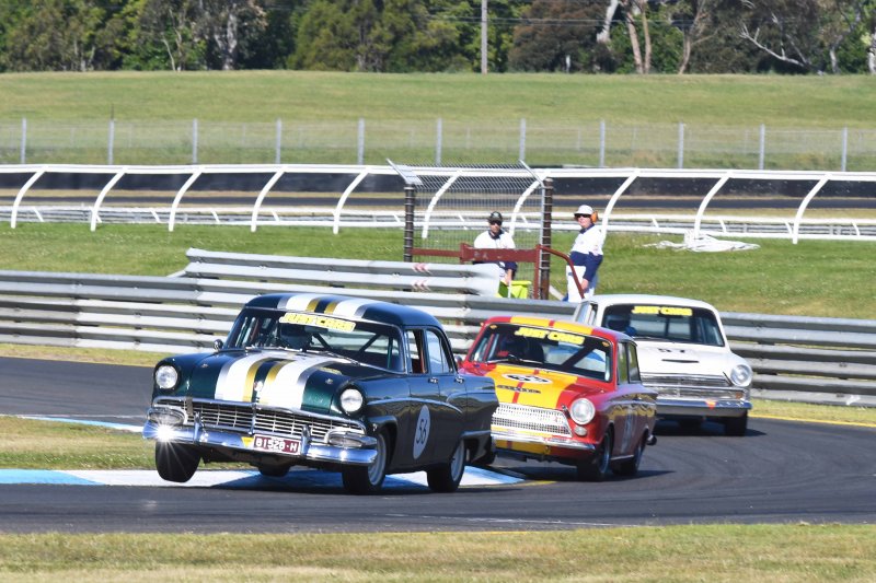 Derek McLaughlan's magnificent Customline pursued by Johnny Luxmoore's Cortina