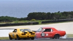 A tiny touch turned Andrew Whiteside's Mustang into a grass sled down into Honda and Trevor Talbot's Camaro