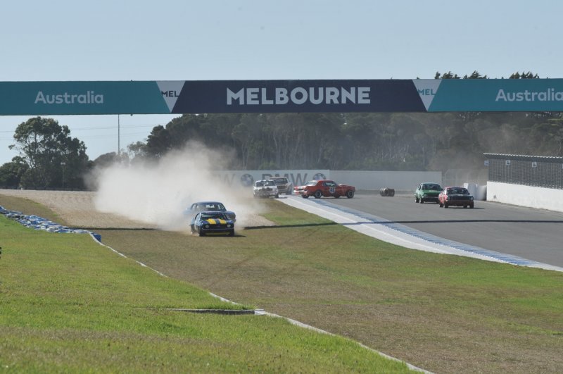 Leo Tobin spins on oil, sandblasting in the gravel trap