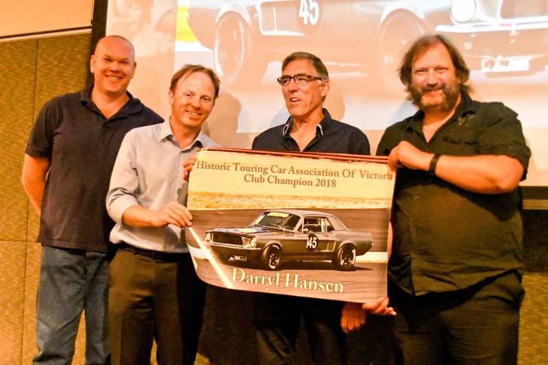 Crew Craig Smith and Ross Liersch help Darryl Hansen receive Phil Wisewould's big print