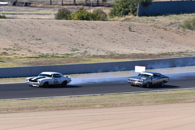 Darren Collins locks a brake on the very last corner and...