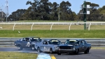 WA's Graeme Woolhouse's Mustang tagged Darryl Hansen after winning Best Presented the day before
