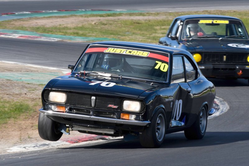 Dented but not defeated, Wayne Rogerson leads fellow NSW Mazda mate Allan Mayne