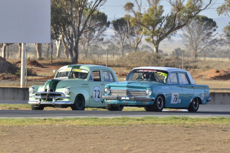 Philip-Barrow’s-Holden-FJ-and-Don-Costelloe’s-EH-were-locked-together-all-weekend.John-Lemm