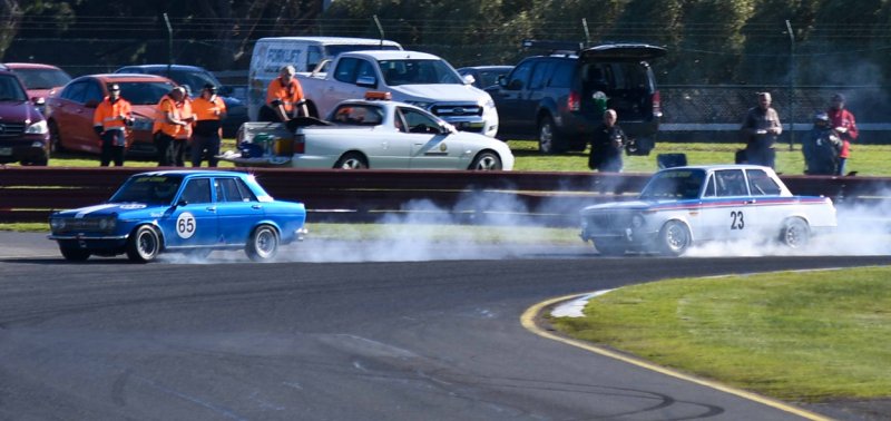 Rookie-Harrison-Ford-Datsun-1600-and-Rob-van-Stokrom-BMW-locked-into-brake-battles