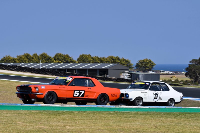 Best-Presented-winner-Adam-Walton-NSW-Mustang-leads-Peter-McNivens-Torana.