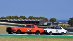 Best-Presented-winner-Adam-Walton-NSW-Mustang-leads-Peter-McNivens-Torana.