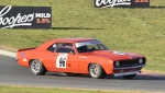 Aldo-De-Paoli’s-Camaro-scrapes-its-exhaust-on-its-way-to-a-win