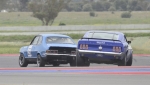 Andy-Williams-passes-Ian-Mewett-for-the-lead-2-laps-to-go-Race-2.