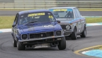 Rob-van-Stokrom_s-BMW-shadowed-Nathan-Gordon_s-Torana-in-Race-1.-Ian-Smith-photo