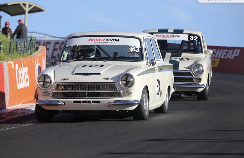 Don-Knight_s-pushrod-pushes-Mike-George_s-Lotus-over-the-top-in-the-battle-of-the-Cortinas.-Throttlejamphotography.