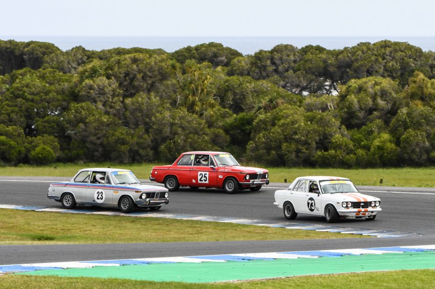David-Brown_s-Datsun-leads-the-BMWs-of-Rob-van-Stokrom-and-Justin-Brown-in-Under-2-Litre-clash.