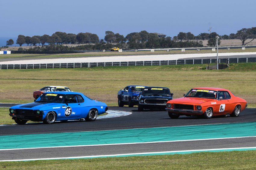 Monaro-v-Mustang-Mumbo-Nathan-Gordon-and-Marc-Tessari-ahead-of-Andrew-Lane-Darcy-Russell-and-Darryl-Hansen.-