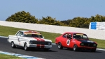 Bill-Trengrove-pokes-the-Falcon-Sprint-under-Jim-McNiven_s-Mazda