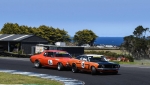 Marc-Tessari-sniffing-for-a-pass-on-Darryl-Hansen_s-Mustang.