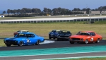 Monaro-v-Mustang-Mumbo-Nathan-Gordon-and-Marc-Tessari-ahead-of-Andrew-Lane-Darcy-Russell-and-Darryl-Hansen.-