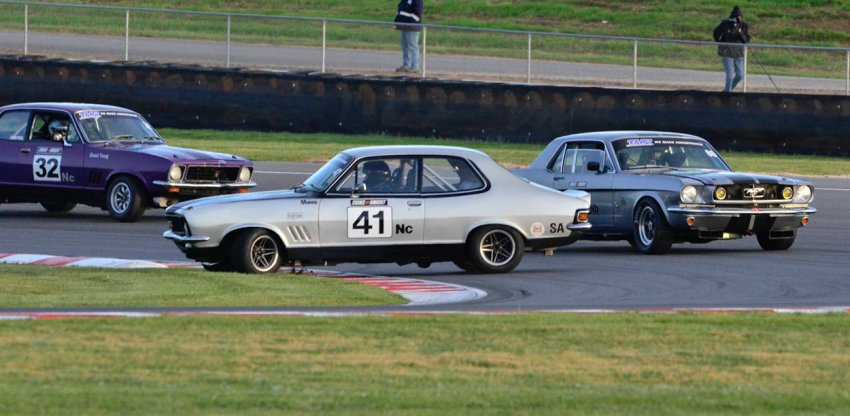Brett-Munns-spins-the-Torana-as-Graeme-Woolhouse-and-Stuart-Young-avoid.