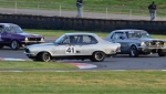 Brett-Munns-spins-the-Torana-as-Graeme-Woolhouse-and-Stuart-Young-avoid.