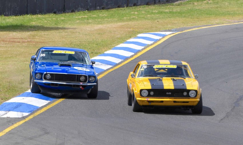 Trevor-Talbot-muscles-the-Camaro-past-Ian-Mewetts-Mustang