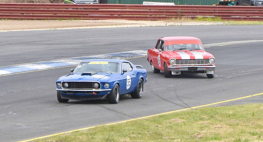 Willie-van-Wersch-aims-the-Chev-Nova-at-Qlds-Ian-Mewett