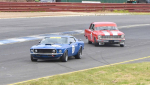Willie-van-Wersch-aims-the-Chev-Nova-at-Qlds-Ian-Mewett