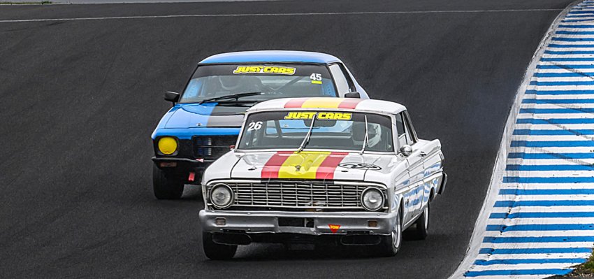 Nathan-Gordon_s-Monaro-menaces-Jervis-Ward_s-Falcon-Sprint-in-the-gloom.-Brett-Butler-photo