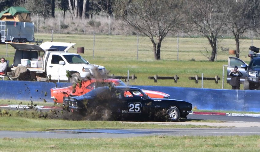 Adrian-Moyle-mud-plugs-as-fellow-Camaro-driver-Tony-Hubbard-pounces