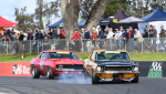 Darren-Collins-locks-up-keeping-the-Mustang-in-front-of-Brent-Tregrove_s-Camaro