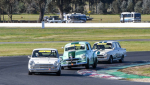 Phil-Barrow_s-FJ-squeezes-between-the-Cortinas-of-Les-Walmsley-and-Don-Knight