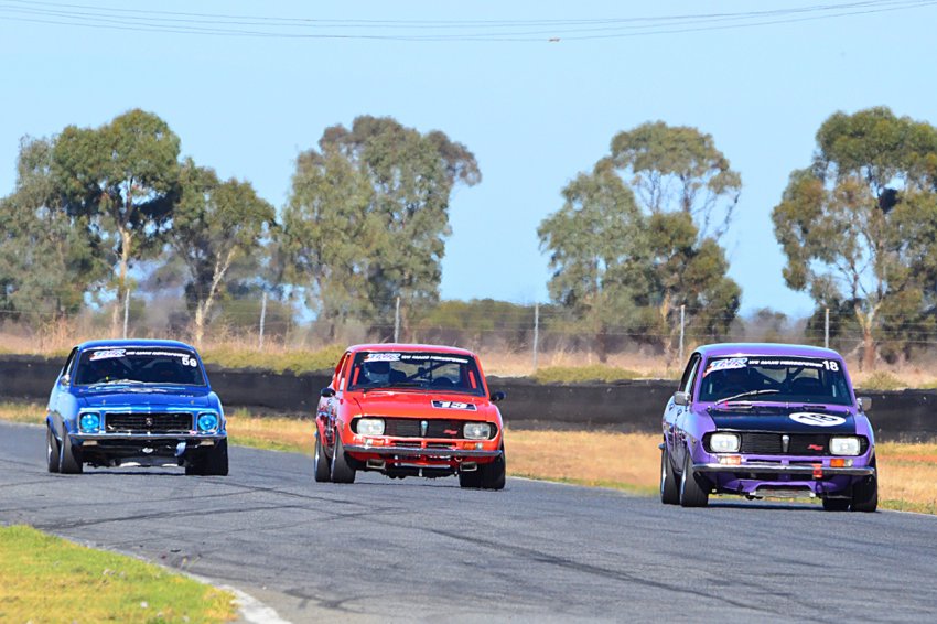 R1-podium-Vic_s-Darren-Hossack-Mazda-Andrew-Williams-Torana-and-Peter-McNiven-Mazda