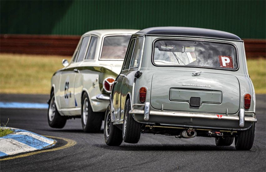 Spirit-of-the-60s-swift-newcomer-Geoffrey-Hulbert-chases-Michael-George-into-T1.-Photo-by-Deano_s-Race-Pics