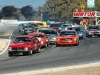 gary-edwards-heads-a-hot-field-into-turn-1-neil-hammond-pic